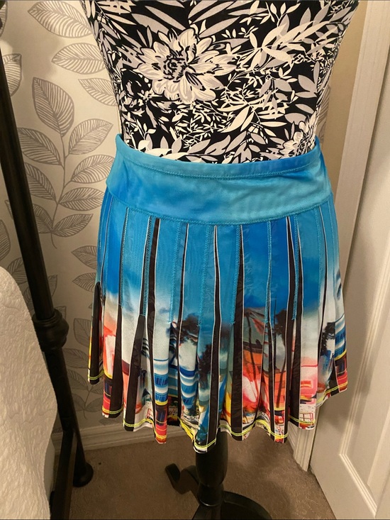 Lucky in Love Dresses & Skirts - Lucky in Love Sheer pleated performance skirt featuring a Beach Postcard print